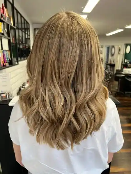 Wavy, highlighted hair from behind